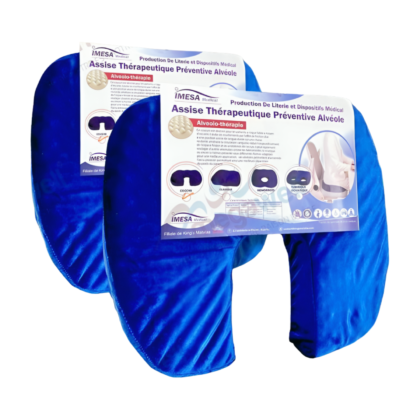 Coussin ergonomique Kings Matelas Imesa en mousse à mémoire de forme, conçu pour soulager les douleurs au coccyx. Housse amovible et lavable.