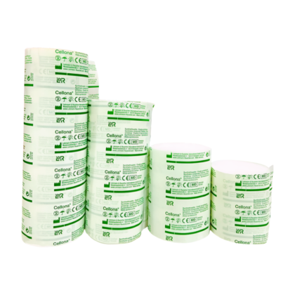 Ouate orthopédique LR Cellona, en fibres de cellulose 100% naturelles, de couleur blanche et de texture douce et absorbante. Présentée en rouleau, elle est conçue pour les pansements, compresses et la protection des plaies légères.