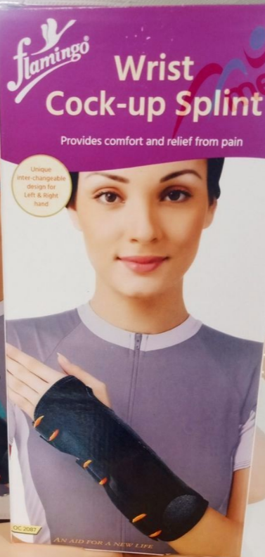 Orthèse de poignet réglable Flamingo OC 2087, vue de face. Orthèse en tissu respirant de couleur chair avec des baleines rigides sur les côtés et un système de fermeture velcro. Conçue pour le soutien, le confort et la mobilité, idéale pour soulager les douleurs liées à la tendinite, l'entorse ou le canal carpien. Disponible en tailles S à 2XL.