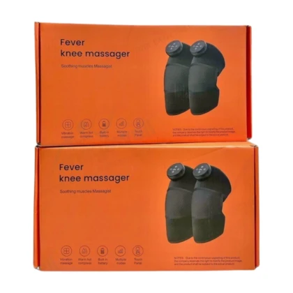 Appareil de massage chauffant Berbas (BR250) : Dispositif compact et ergonomique, probablement de couleur neutre (gris, blanc ou beige), conçu pour le genou. Il présente une surface texturée ou avec des motifs pour le massage, et des indicateurs lumineux suggérant les modes de fonctionnement. L'appareil semble alimenté par secteur et est potentiellement accompagné d'une télécommande ou d'un bouton de commande visible. Il est destiné à être porté ou positionné sur le genou pour soulager la douleur et améliorer la circulation.