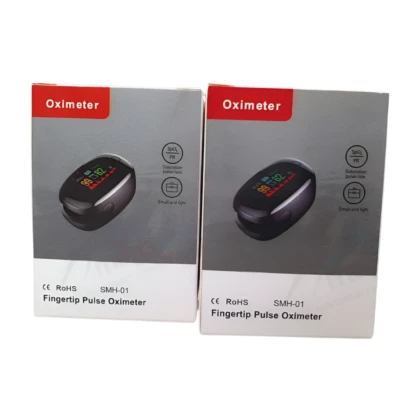 Oximètre Pulse Berbas BR438 : petit appareil électronique portable, généralement de couleur bleue ou noire, avec un écran affichant la saturation en oxygène (SpO2) et la fréquence cardiaque. Il est conçu pour être tenu dans la main ou porté au doigt pour une mesure facile et rapide à domicile.