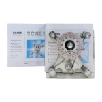 Pèse-personne mécanique Glass MG03, couleur sombre, avec une plate-forme plate et sécurisée. Affichage analogique à aiguilles pour une lecture facile du poids, jusqu'à 120 kg. Design sobre et discret, sans nécessite de pile.