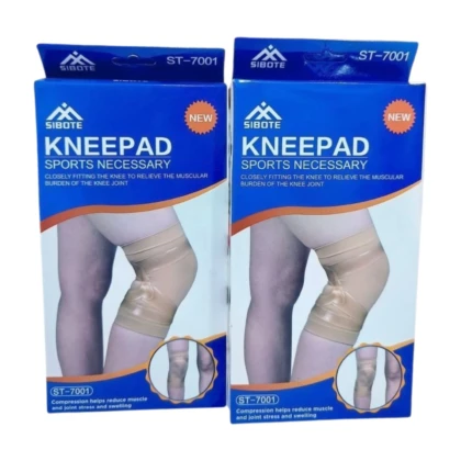 Genouillère élastique de couleur [couleur de la genouillère], couvrant le genou droit/gauche, avec une texture [type de texture, ex: lisse, légèrement texturée] et une conception [type de conception, ex: ouverte au niveau de la rotule, fermée]. Elle semble être fabriquée dans un matériau [type de matériau, ex: tissu extensible, néoprène] et présente une bande élastique [description de la bande, ex: sur les côtés, au niveau du bas] pour un maintien.