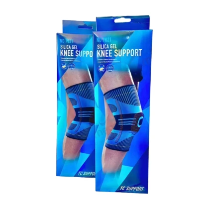 Genouillère en gel de silice Yc 7821, visiblement conçue pour offrir soutien et confort. Elle est de couleur [Préciser la couleur principale de la genouillère, ex: bleu clair, gris, noir] et présente une forme [Décrire la forme générale, ex: enveloppante, articulée, ouverte sur le patella]. Le matériau semble [Décrire la texture, ex: souple, lisse, légèrement texturé]. On distingue [Décrire d'éventuels motifs, logo ou détails, ex: le logo "Yc" sur le côté, des motifs en relief, des zones de ventilation]. Elle est destinée à être portée au niveau du genou pour soulager les douleurs.