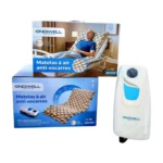 Matelas à air Ondiwel OM500 : Matelas gonflable avec une structure de bulles alternées, visiblement conçue pour le confort et la circulation sanguine. Hypoallergénique et facile à utiliser.